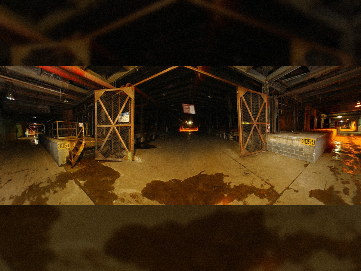 180-degree view from K-25 West Wing Truck Alley running south (left) to north (right) looking directly into Withdrawal Alley 21A